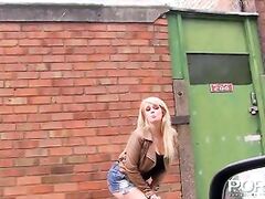 Busty amateur cutie Bonnie D pissing in public