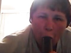 plump clean lady with cucum (no sound)